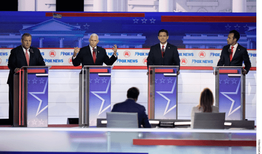 Former Vice President Mike Pence speaks as from left, former New Jersey Gov. Chris Christie, Florida Gov. Ron DeSantis and businessman Vivek Ramaswamy listen during a Republican presidential primary debate hosted by FOX News Channel Wednesday, Aug. 23, 2023, in Milwaukee.